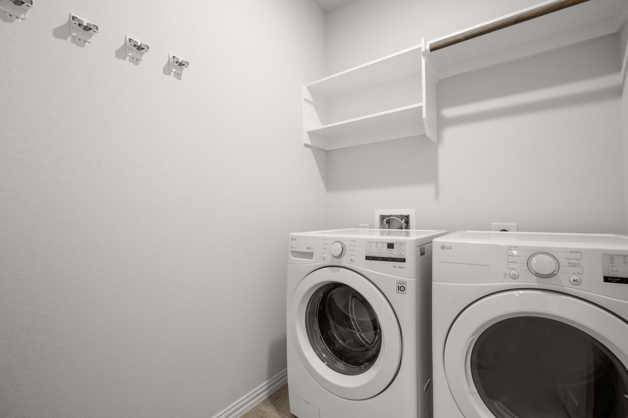 6708 Avila Way Pflugerville, TX 78660 - Photo 31 of 36 a utility room with dryer and washer