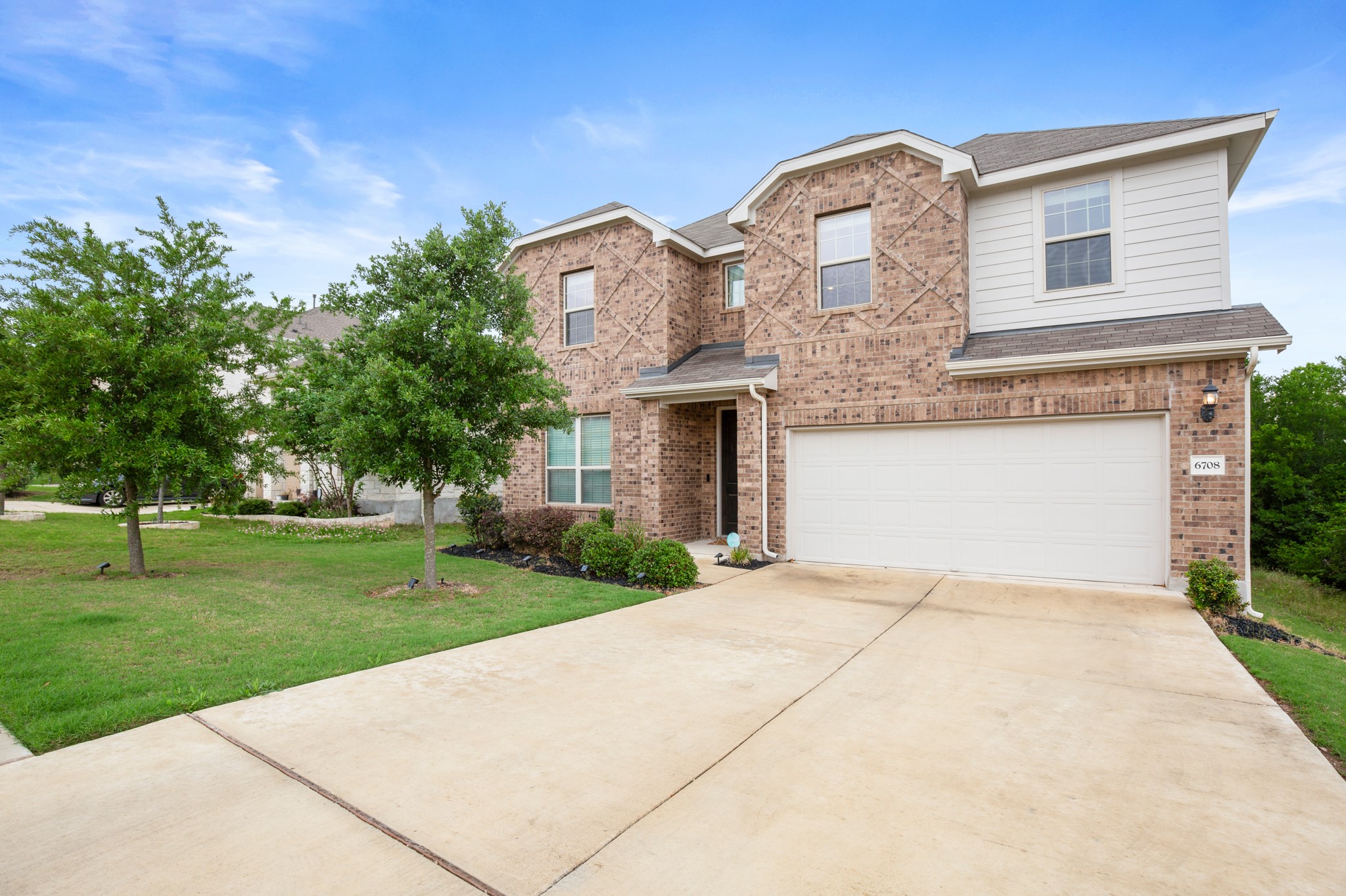 6708 Avila Way Pflugerville, TX 78660 - Photo 35 of 36 front view of a house with a yard
