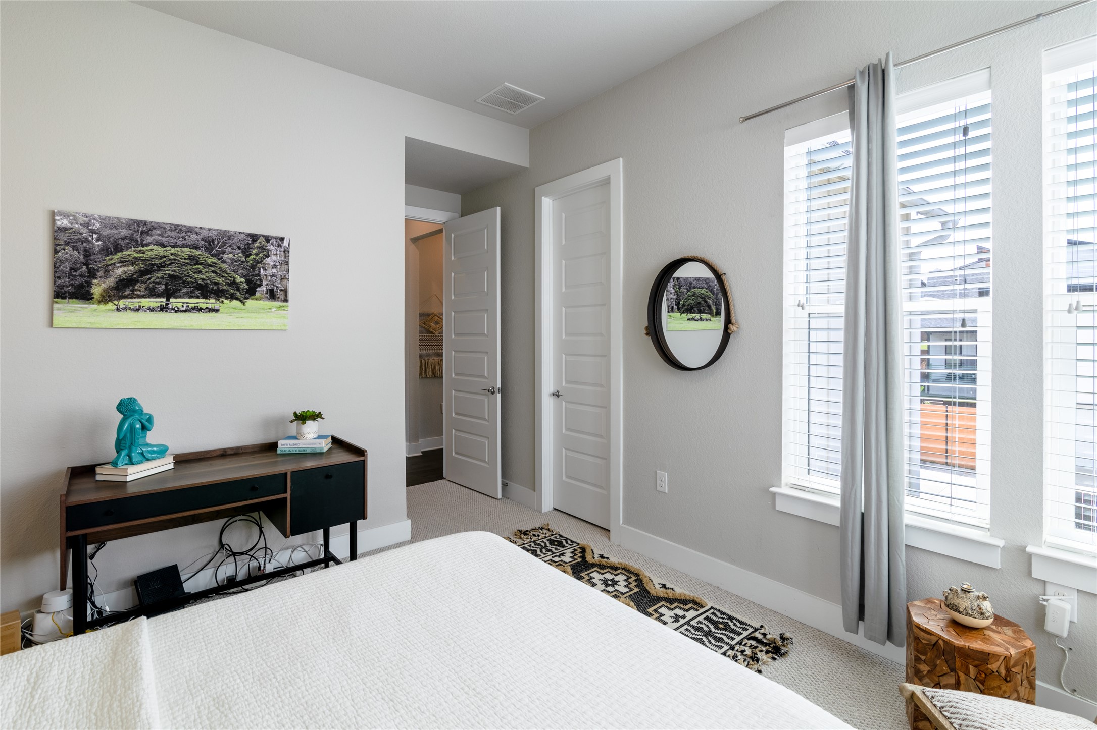 6025 Seville Drive Austin, TX 78724 - Photo 23 of 40 1 of 2 second floor guest bedroom with view of the hallway