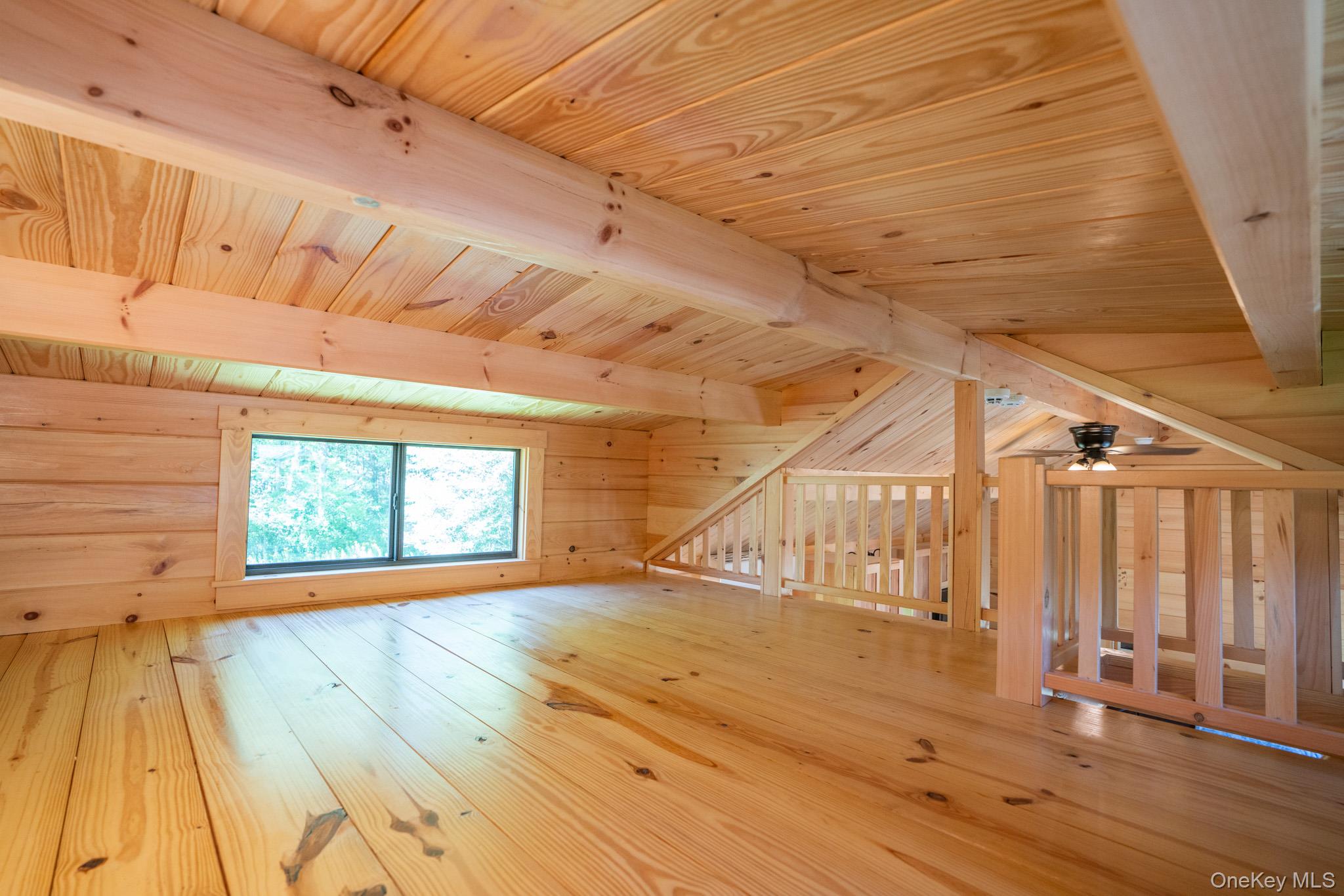 2155 Ed Klug Road Franklin, NY 13839 - Photo 15 of 24 a view of empty room with wooden floor