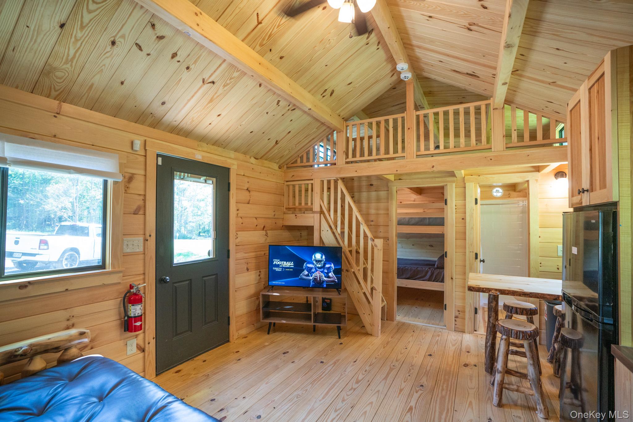 2155 Ed Klug Road Franklin, NY 13839 - Photo 9 of 24 a view of an entryway with wooden floor and windows