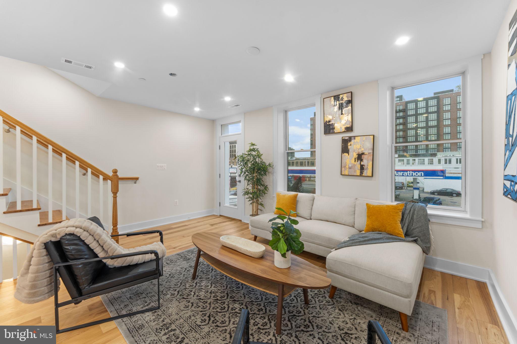 521 Florida Avenue Northeast, Unit 2 Washington, DC 20002 - Photo 15 of 38 a living room with furniture and a wooden floor