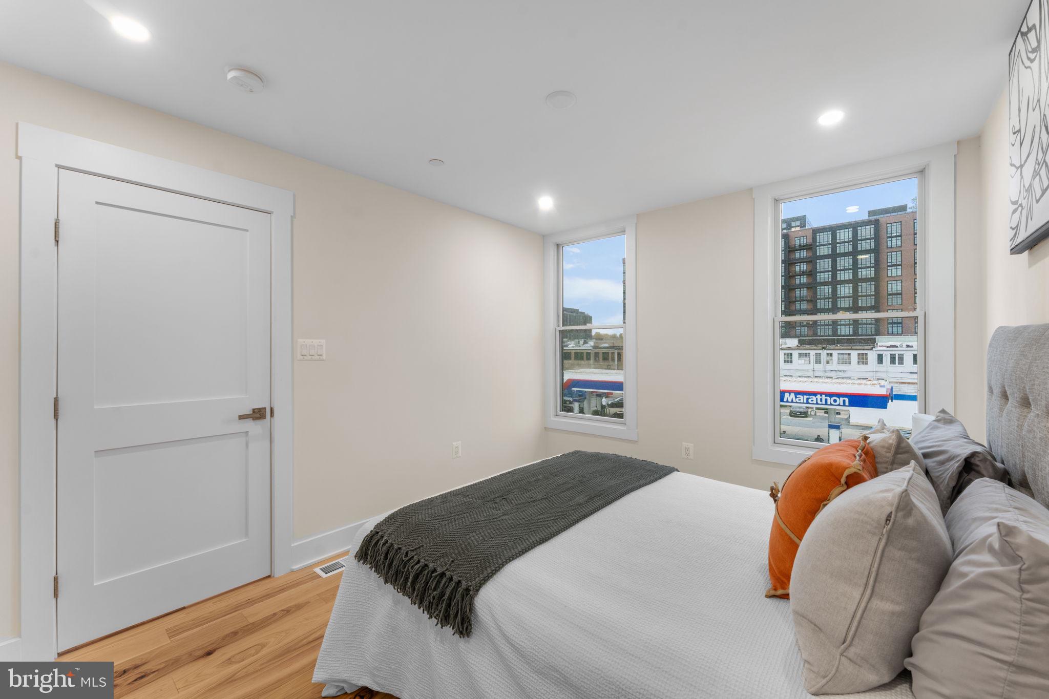 521 Florida Avenue Northeast, Unit 2 Washington, DC 20002 - Photo 23 of 38 a bedroom with a bed and a window
