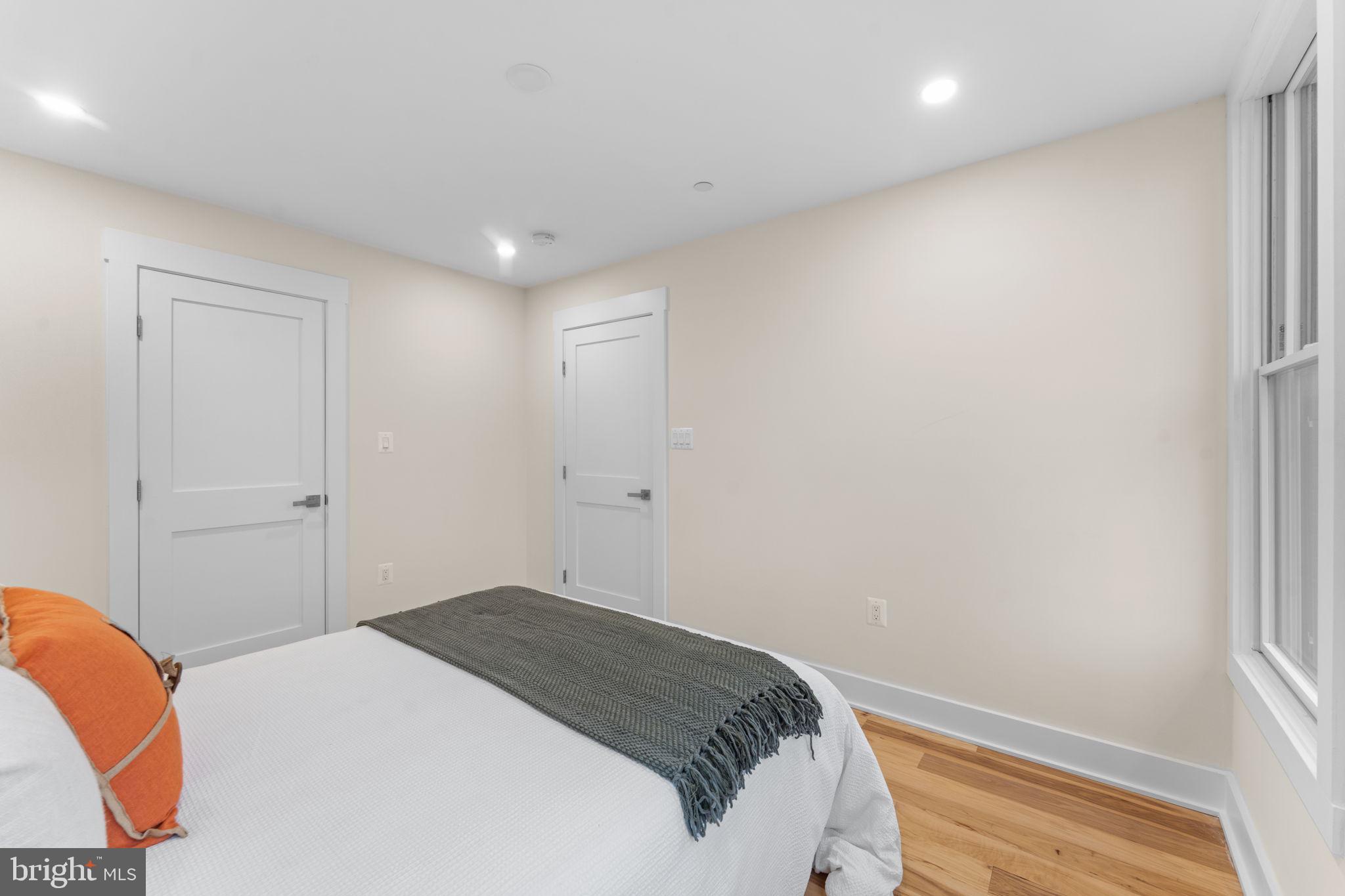 521 Florida Avenue Northeast, Unit 2 Washington, DC 20002 - Photo 25 of 38 a bedroom with a bed and a window