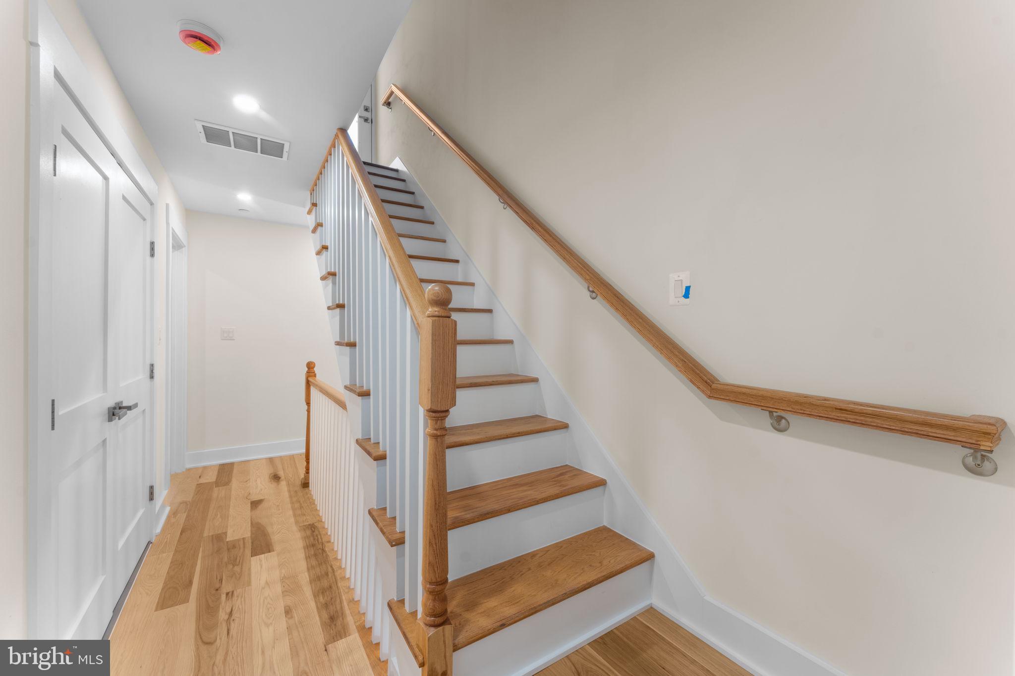 521 Florida Avenue Northeast, Unit 2 Washington, DC 20002 - Photo 28 of 38 a view of entryway with wooden floor and stairs