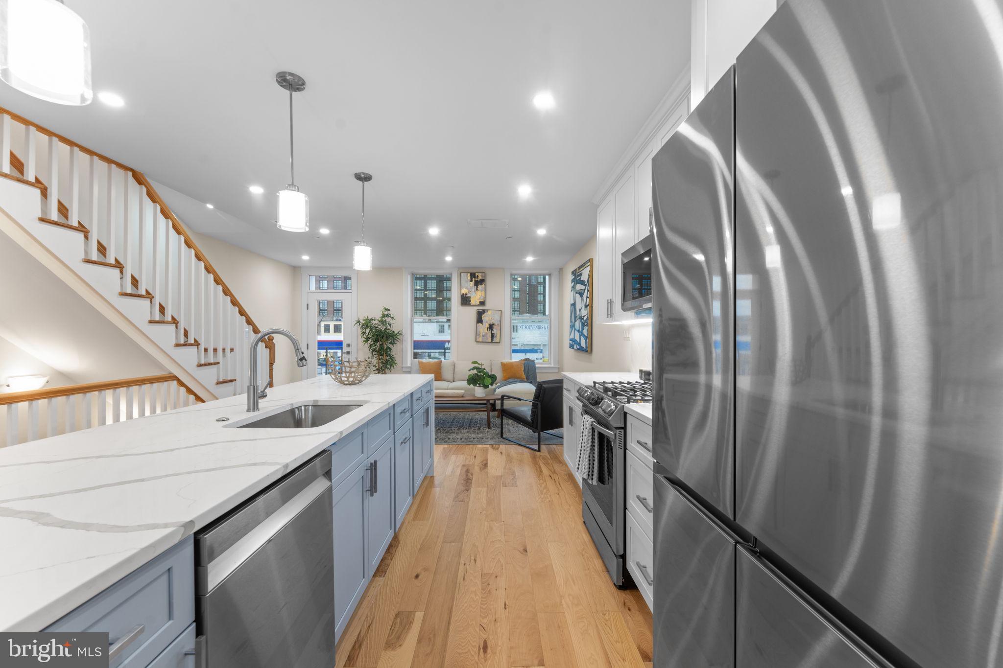521 Florida Avenue Northeast, Unit 2 Washington, DC 20002 - Photo 9 of 38 a kitchen with stainless steel appliances granite countertop lots of counter top space