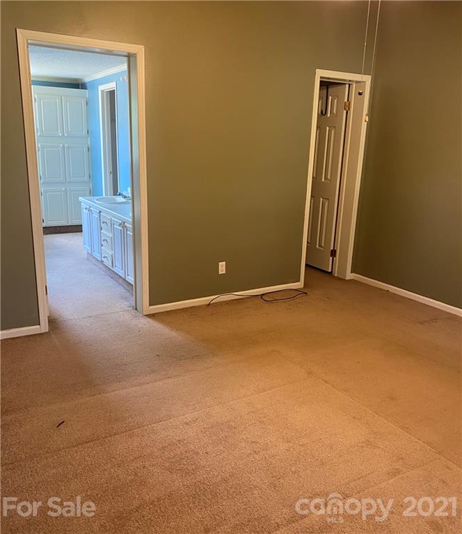 525 Goodwin Road Salisbury, NC 28146 - Photo 17 of 46 an empty room with closet area