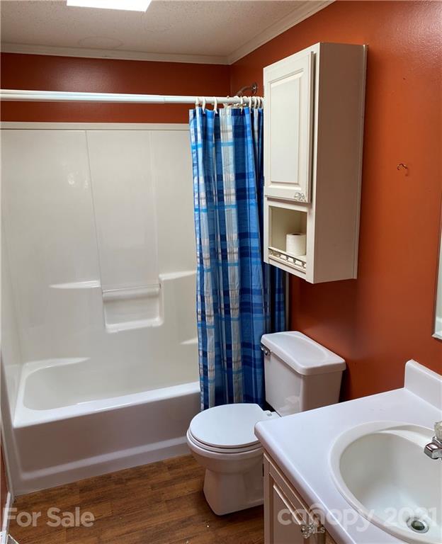 525 Goodwin Road Salisbury, NC 28146 - Photo 30 of 46 a bathroom with a toilet and a shower