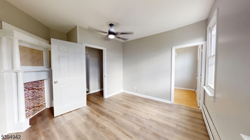 277 2nd Avenue West Newark, NJ 07107 - Photo 2 of 7 a view of entryway with wooden floor