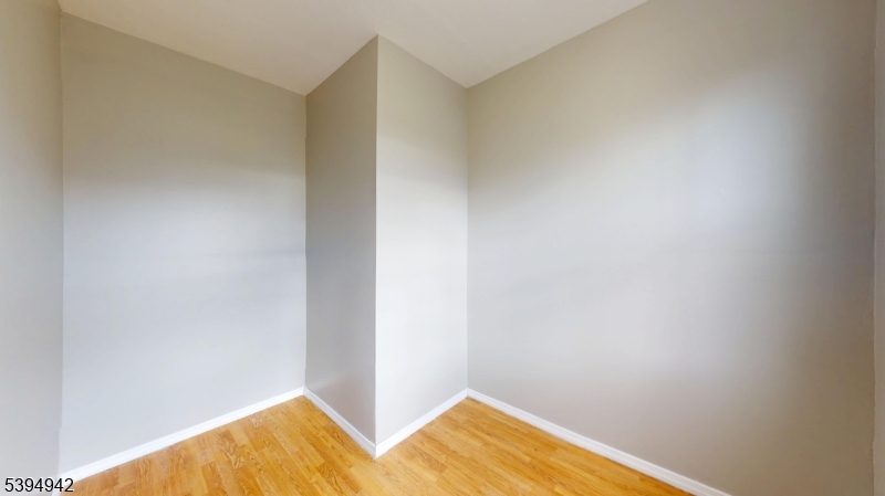 277 2nd Avenue West Newark, NJ 07107 - Photo 3 of 7 a view of a room with wooden floor