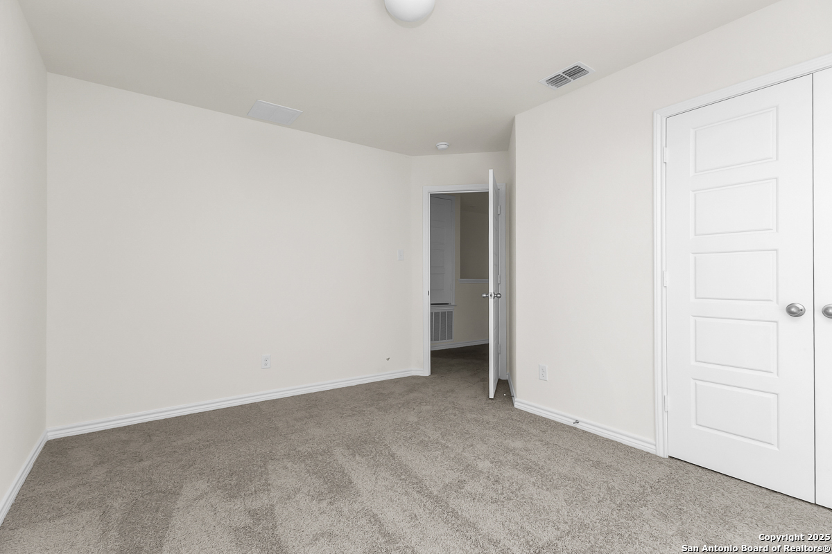 9402 Griffith Run Converse, TX 78109 - Photo 10 of 18 a view of an empty room