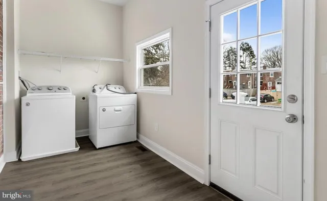a utility room with dryer and washer