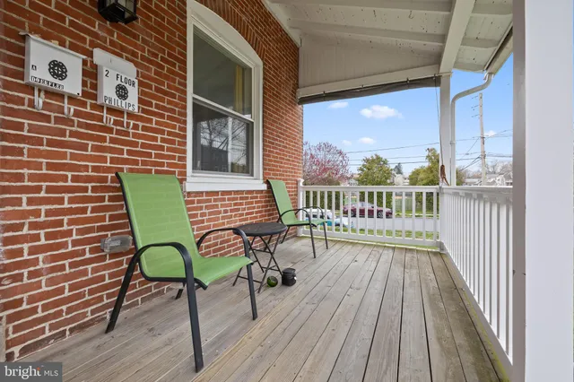 a view of a chair on wooden deck