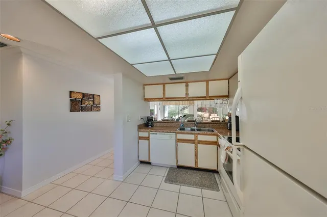 a kitchen with a stove and a sink