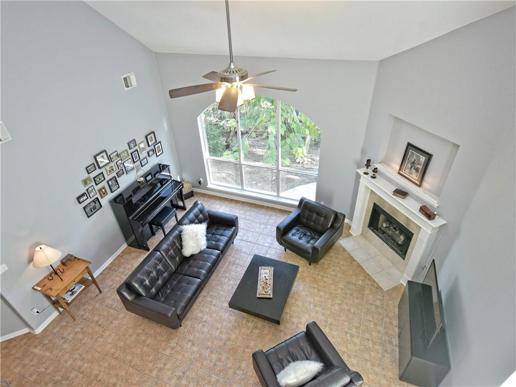 9216 Evening Primrose Path Austin, TX 78750 - Photo 11 of 30 a living room with furniture and a window