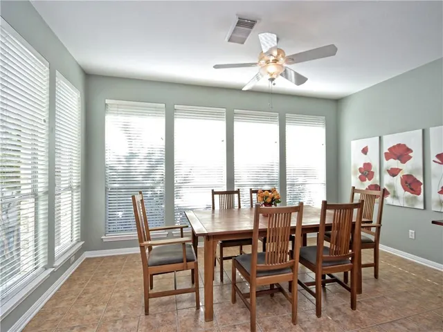 a kitchen with sink refrigerator and outdoor view