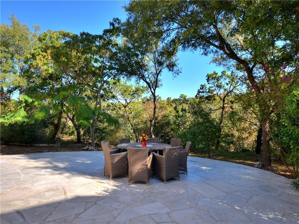 9216 Evening Primrose Path Austin, TX 78750 - Photo 28 of 31 a view of a terrace with a bench