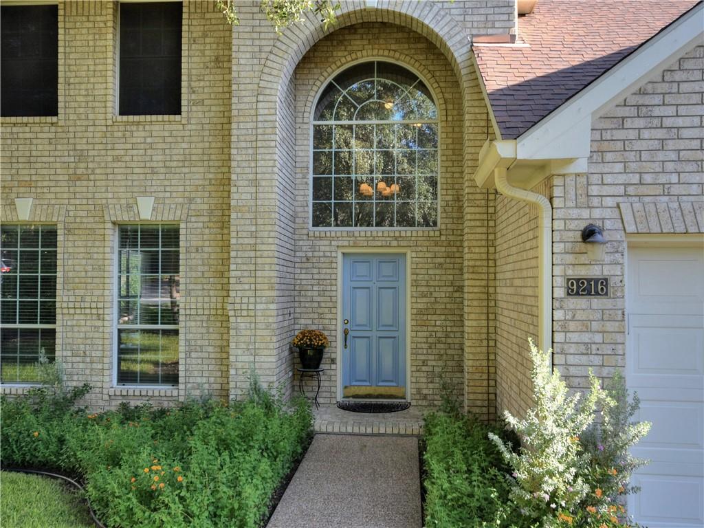 9216 Evening Primrose Path Austin, TX 78750 - Photo 3 of 30 a house view with a outdoor space