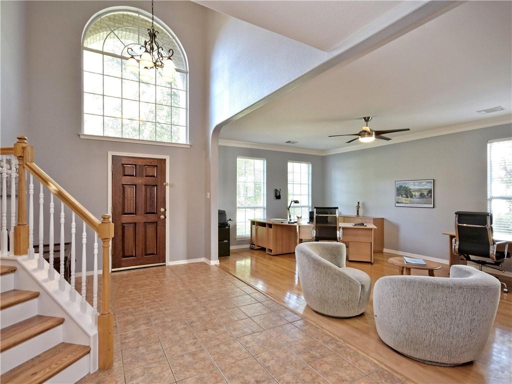 9216 Evening Primrose Path Austin, TX 78750 - Photo 4 of 31 a living room with furniture and a large window