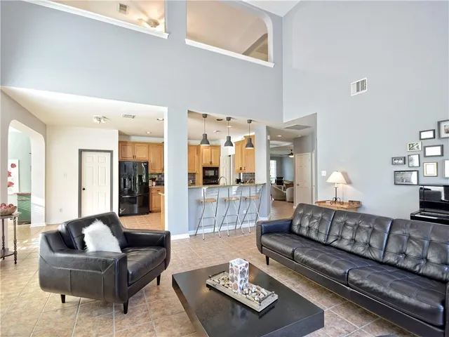 a living room with furniture and a couch