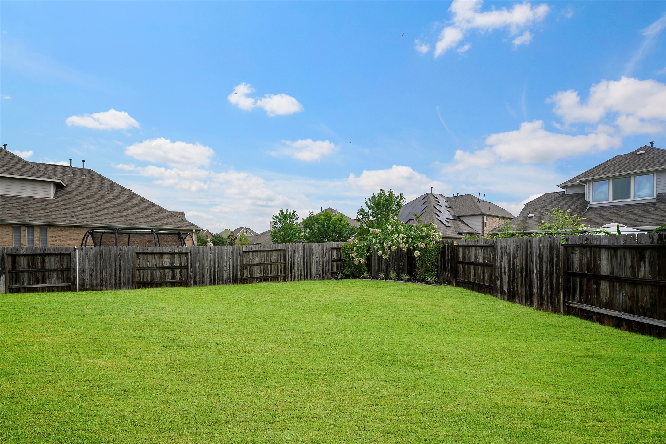 20330 Rosegold Way Spring, TX 77379 - Photo 41 of 48 Beautifully maintained yard with room to create your own outdoor retreat.