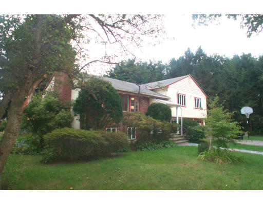75 Haynes Road Newton, MA 02459 - Photo 1 of 1 a front view of a house with a yard
