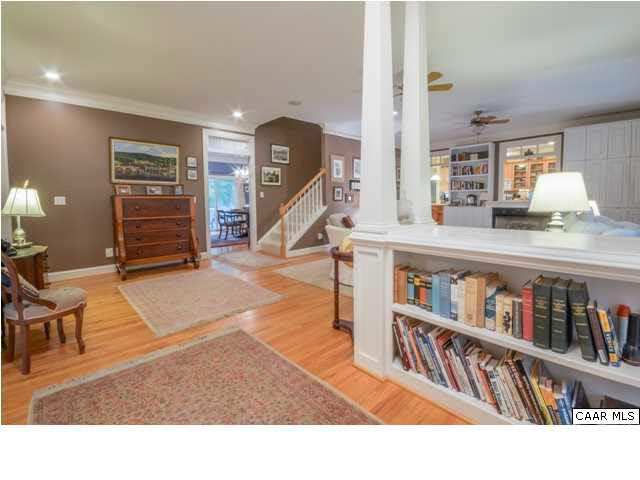 60 Roslyn Heights Road Charlottesville, VA 22901 - Photo 12 of 40 a living room with lots of furniture and a wooden floor