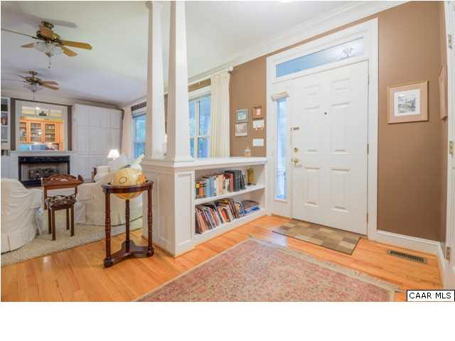 60 Roslyn Heights Road Charlottesville, VA 22901 - Photo 13 of 40 a living room with furniture and a book shelf