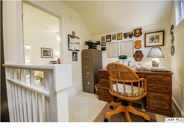 60 Roslyn Heights Road Charlottesville, VA 22901 - Photo 36 of 40 a living room with furniture and baby crib