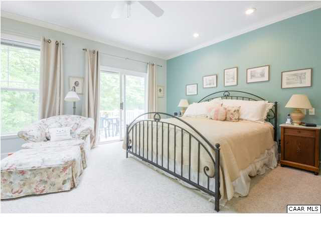 60 Roslyn Heights Road Charlottesville, VA 22901 - Photo 39 of 40 a bedroom with a bed a couch and dresser