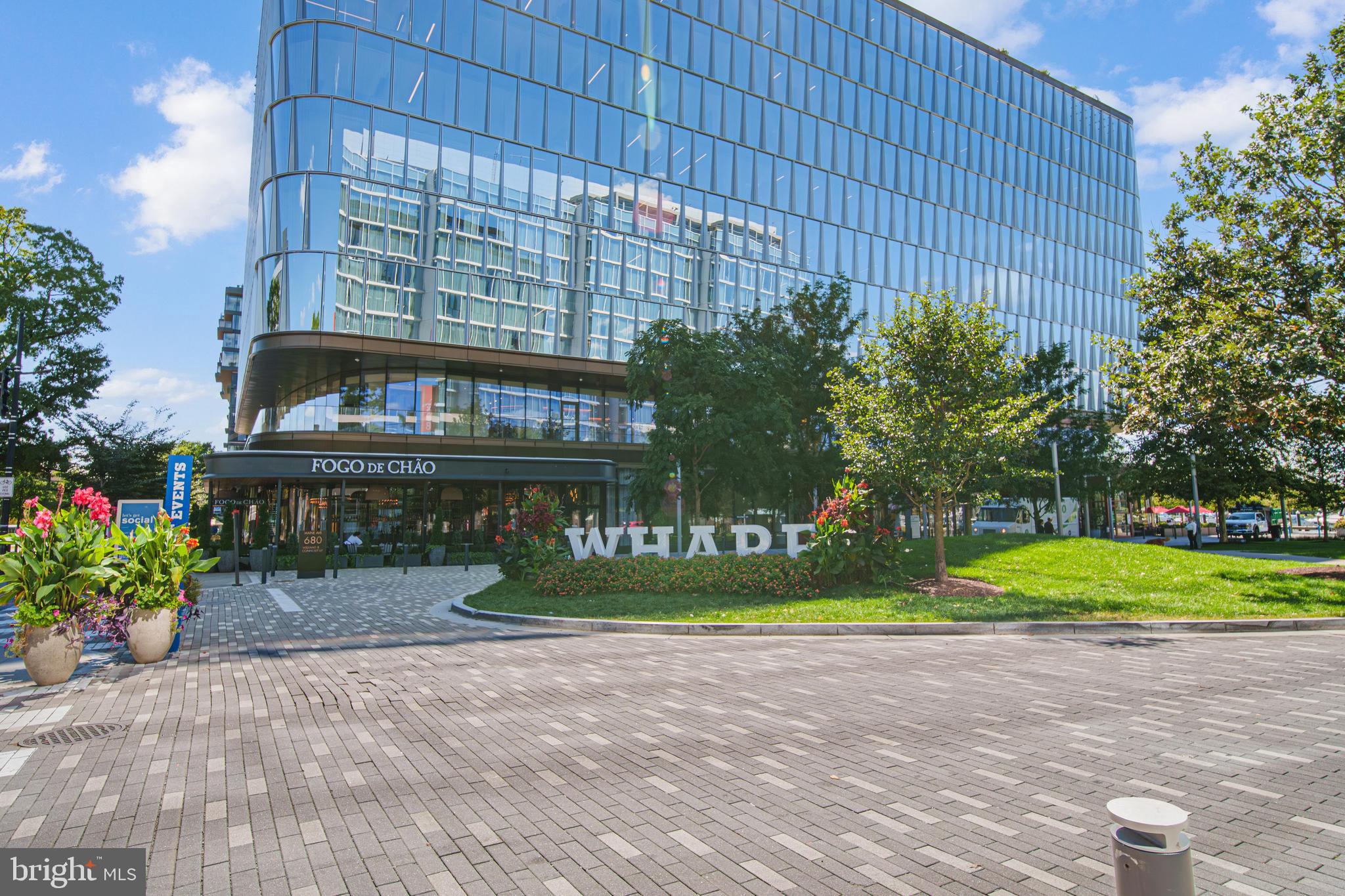 700 7th Street Southwest, Unit 119 Washington, DC 20024 - Photo 25 of 31 a front view of a building with garden