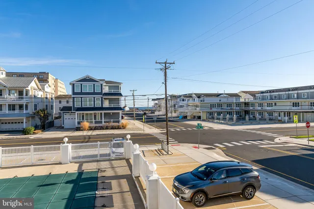 a swimming pool view with a outdoor seating space