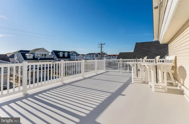 a view of a chairs and table on the wooden floor