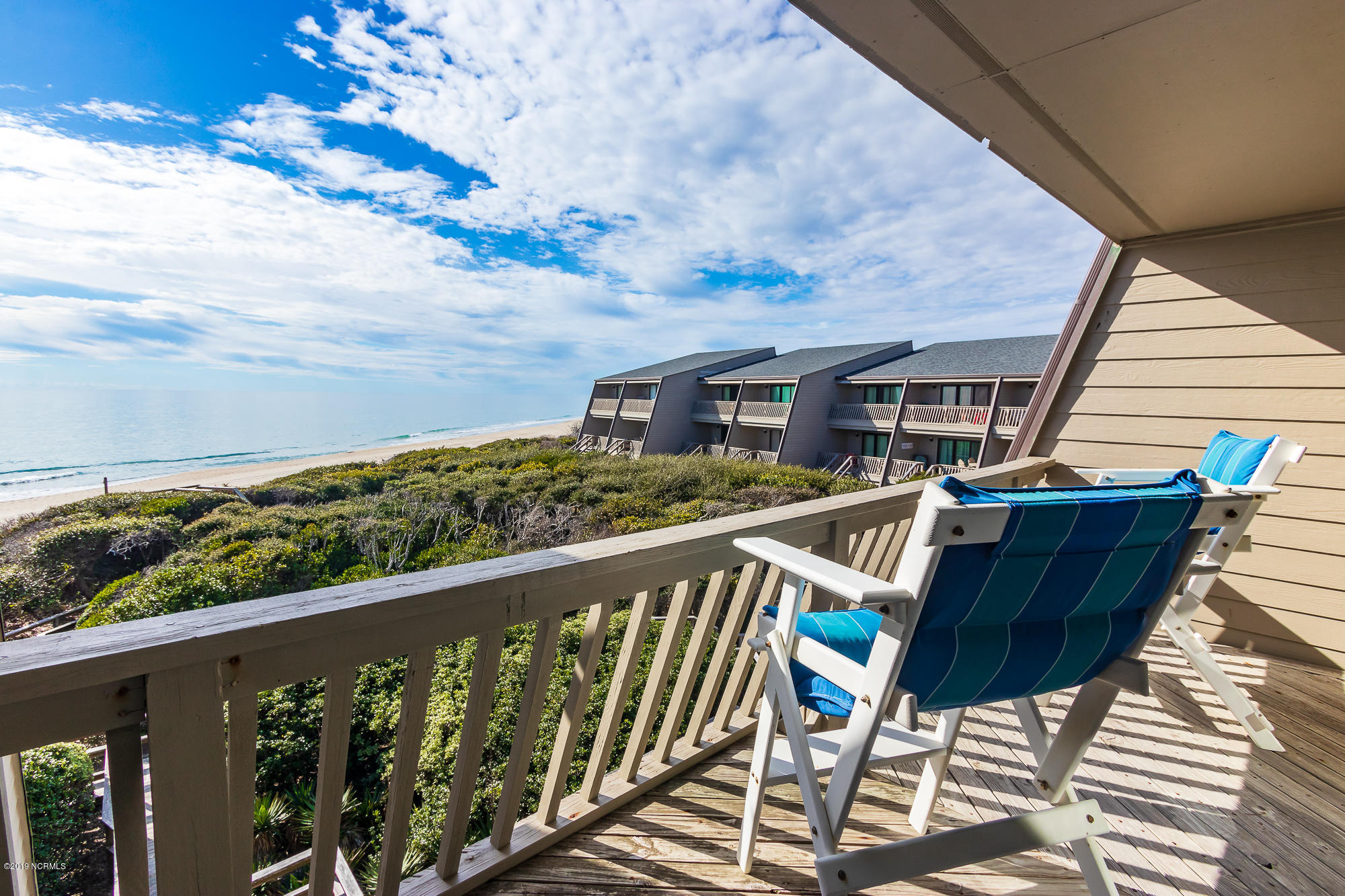 565 Salter Path Road, Unit X3 Pine Knoll Shores, NC 28512 - Photo 16 of 61 Master bedroom suite with private deck