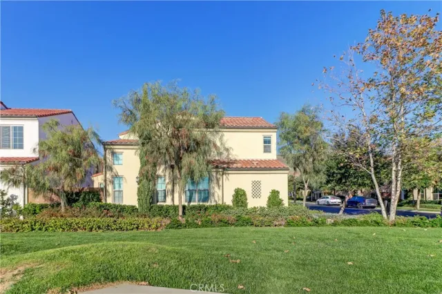 a view of a brick house with a large windows