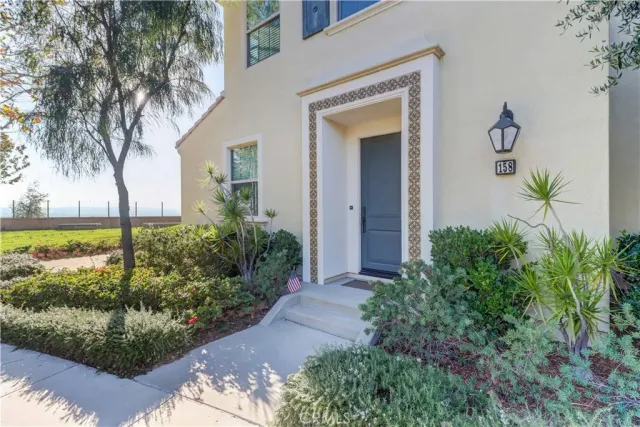 a kitchen with a sink cabinets and appliances