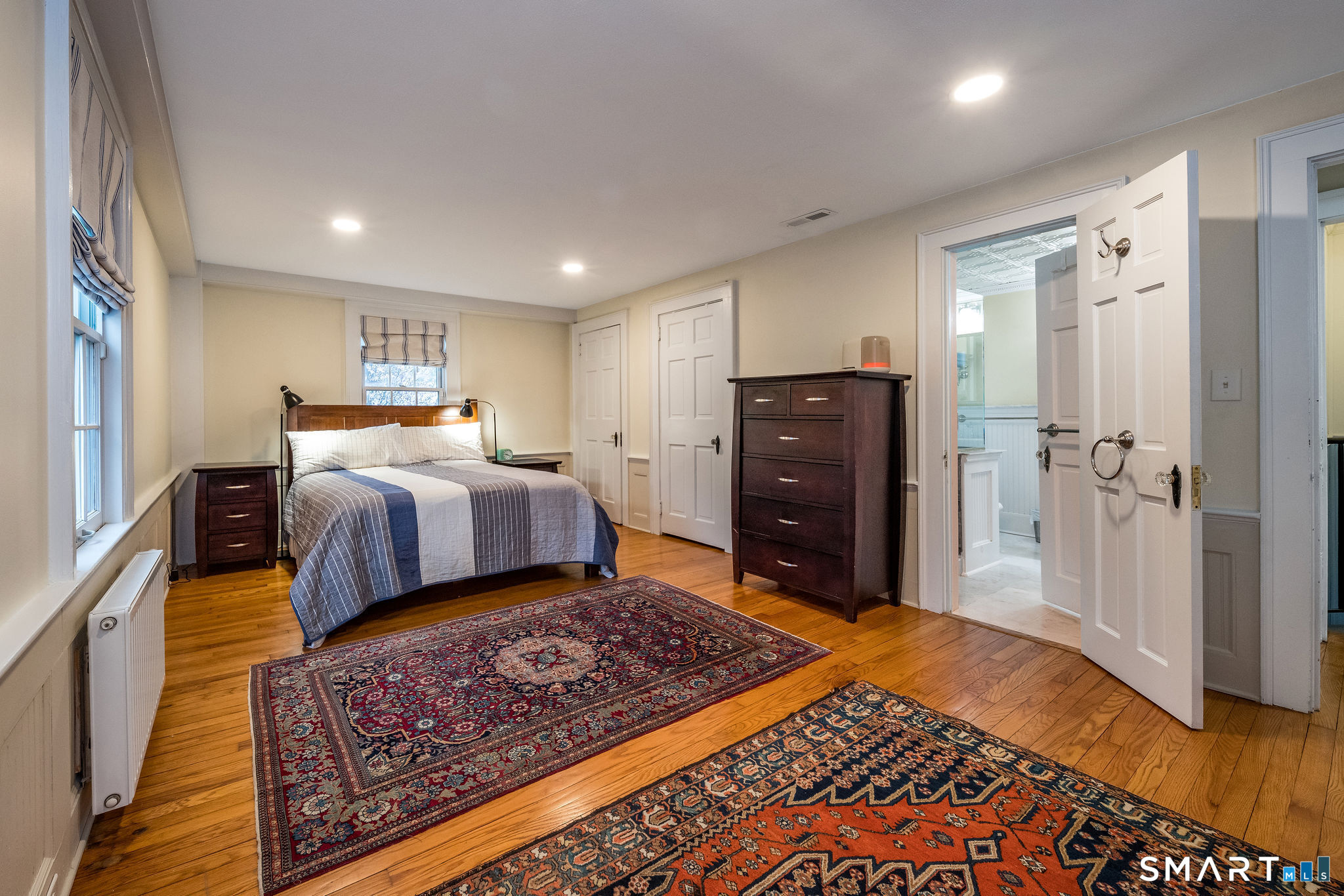 6 Cedar Island Avenue Clinton, CT 06413 - Photo 13 of 36 a bedroom with bed and wooden floor