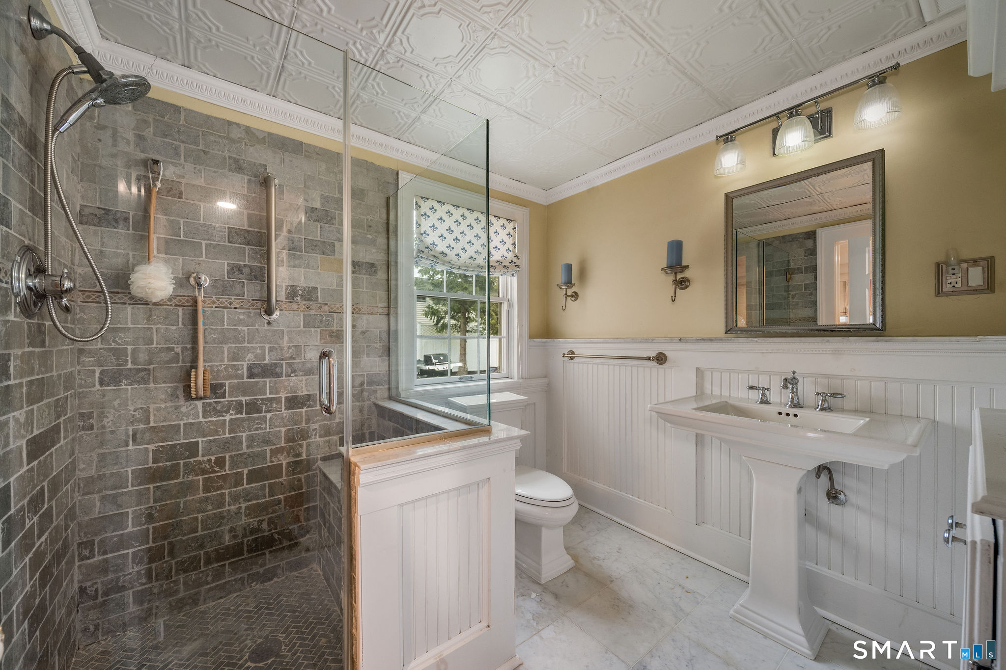 6 Cedar Island Avenue Clinton, CT 06413 - Photo 15 of 36 a bathroom with a toilet sink shower and mirror