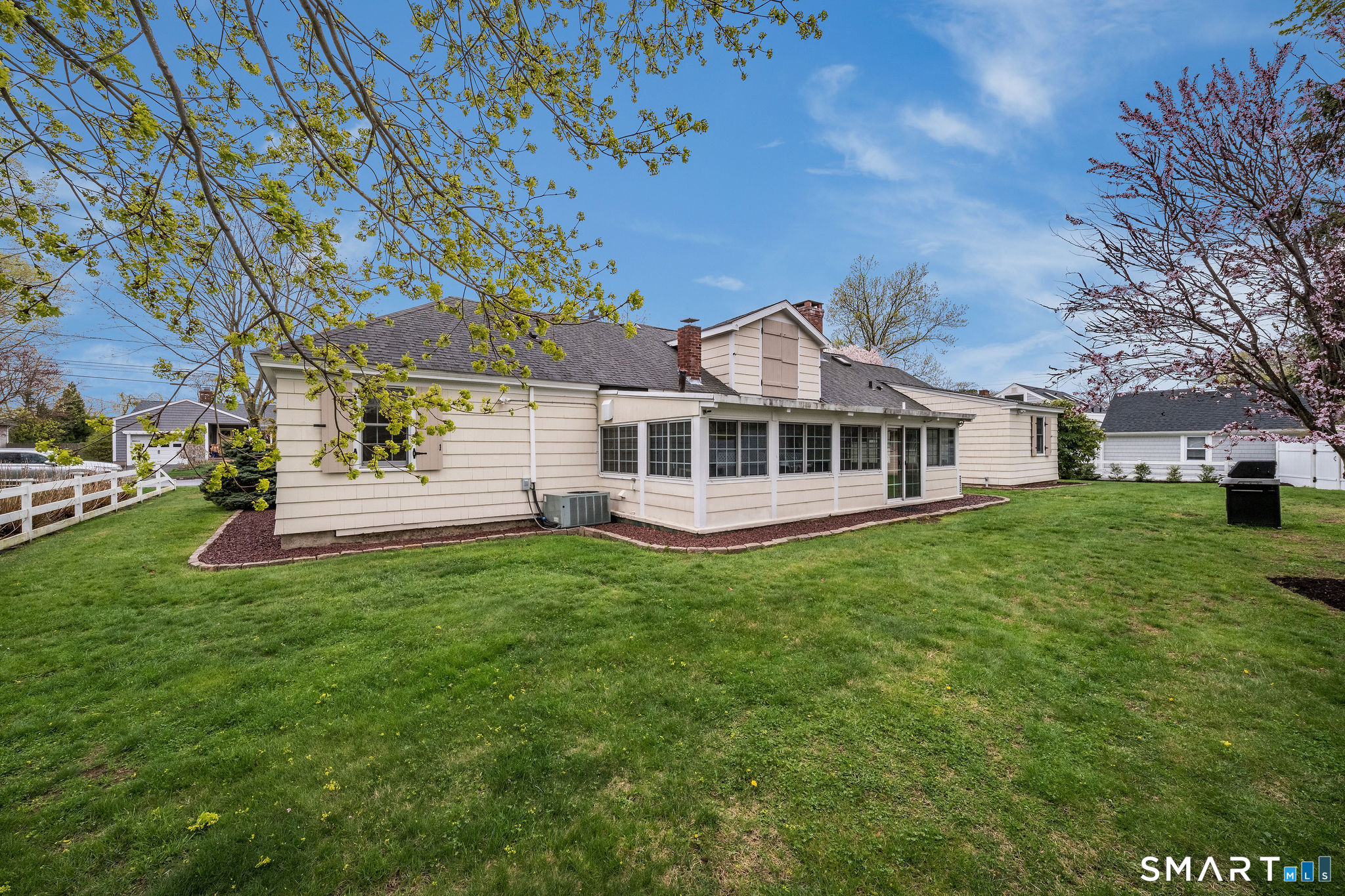 6 Cedar Island Avenue Clinton, CT 06413 - Photo 31 of 36 a front view of a house with a garden