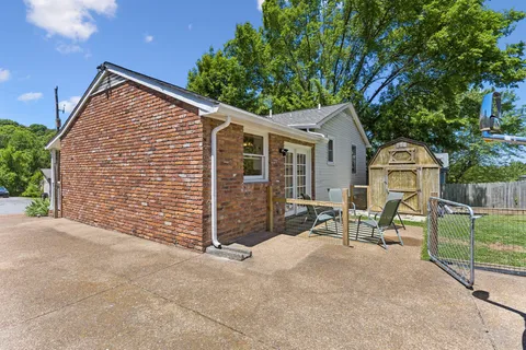 a view of a yard in front of a house