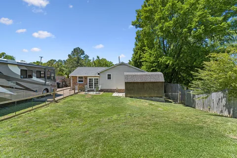 a view of a backyard with a garden