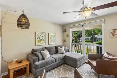 a living room with furniture and a couch