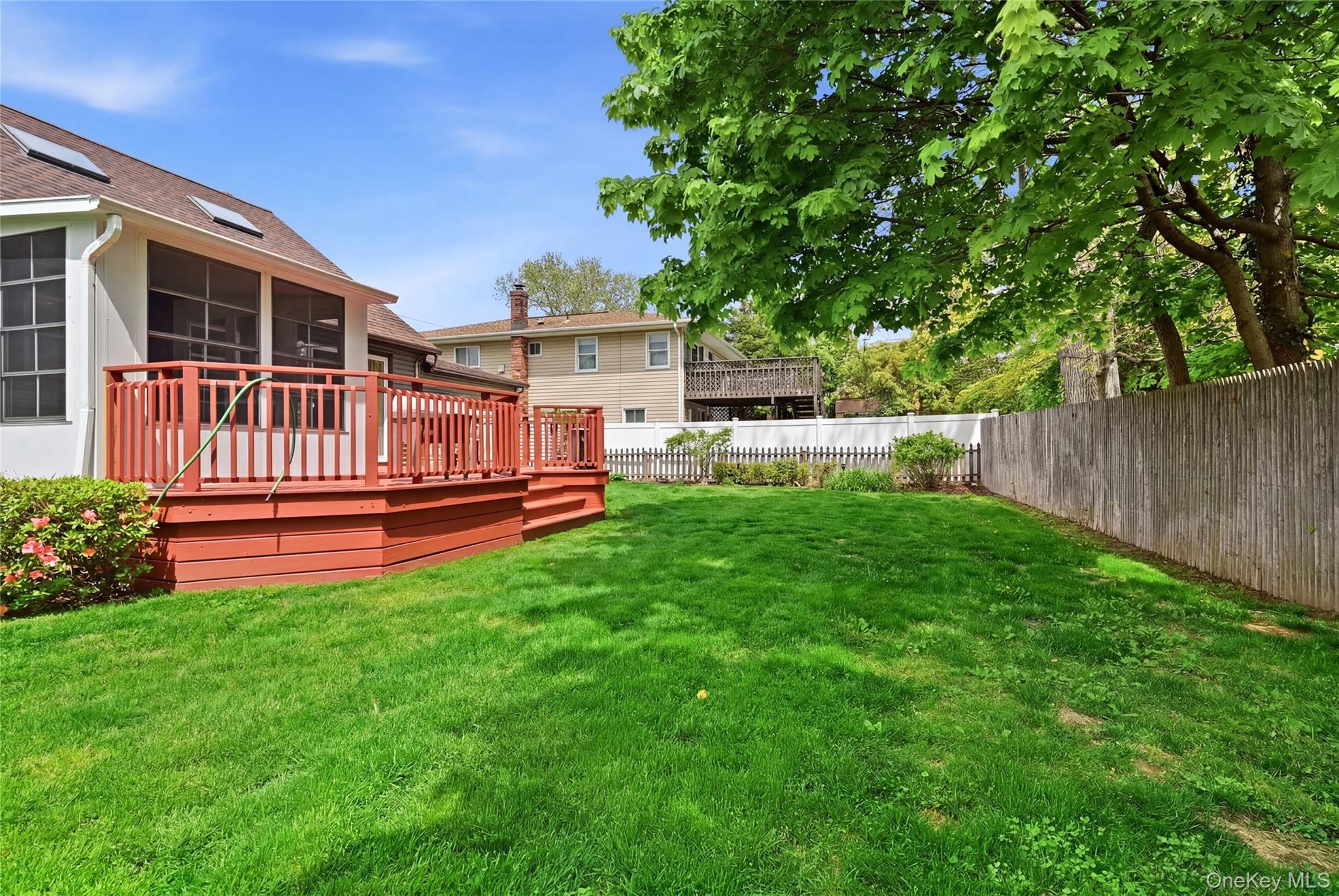 41 Lane Street Lindenhurst, NY 11757 - Photo 31 of 35 Fully fenced yard. 7 zone in-ground sprinklers