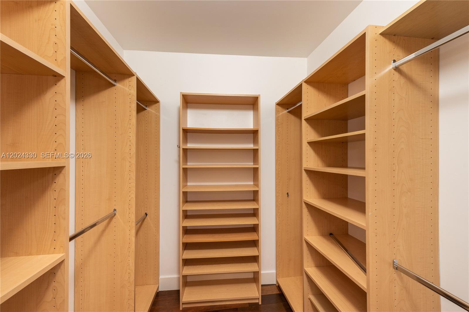901 Brickell Key Boulevard, Unit 2006 Miami, FL 33131 - Photo 22 of 41 Primary Bedroom - Walk In Closet