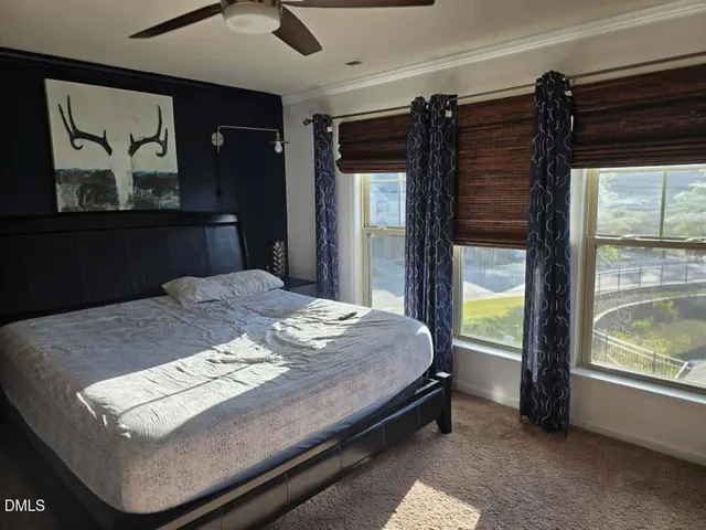 a view of room with a wooden floor