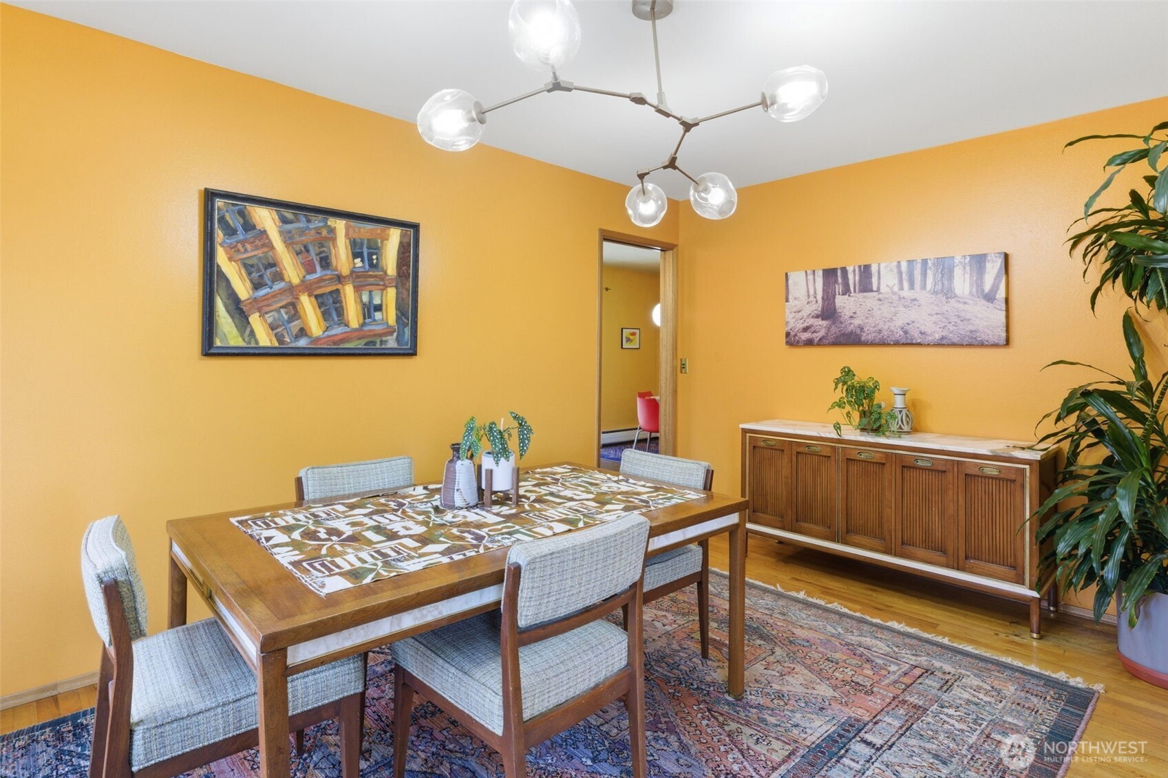 2803 South Walker Street Seattle, WA 98144 - Photo 23 of 40 a view of a dining room with furniture and wooden floor