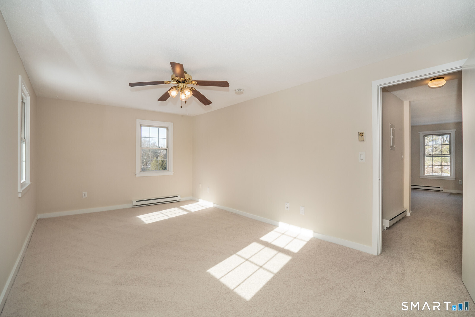 239 Old Farms Road, Unit 7C Avon, CT 06001 - Photo 11 of 17 a view of an empty room with a window