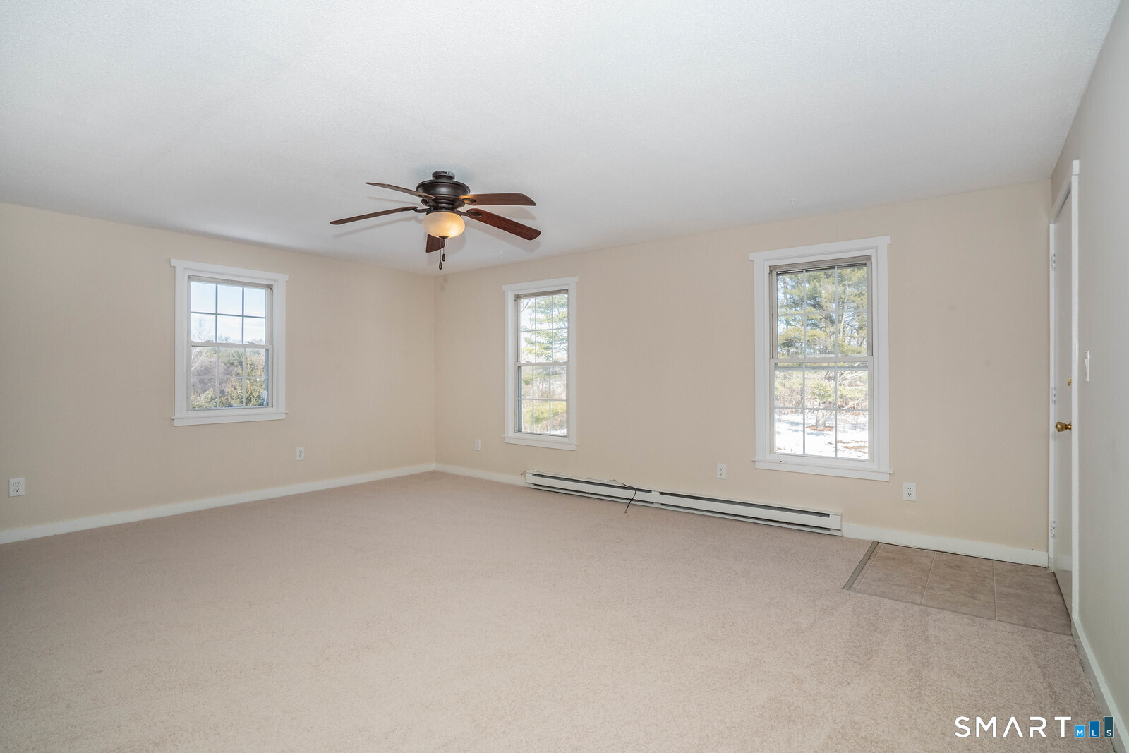 239 Old Farms Road, Unit 7C Avon, CT 06001 - Photo 3 of 17 a view of an empty room with a window