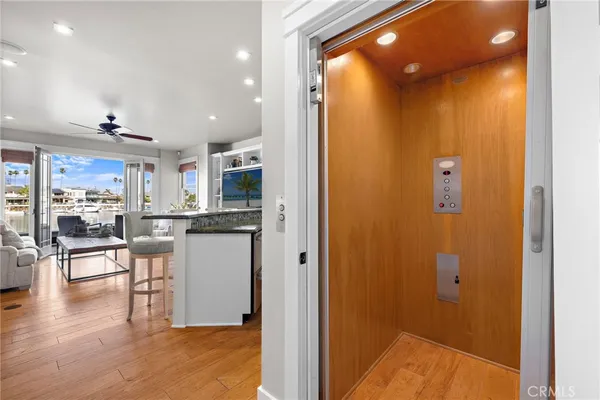 a spacious bathroom with a granite countertop sink and a mirror