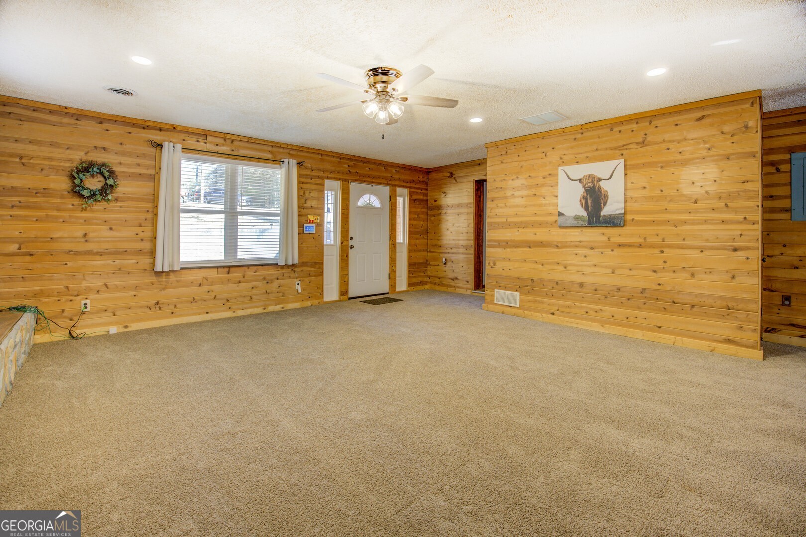 162 Collins Road Jackson, GA 30233 - Photo 22 of 77 a view of an empty room with a window